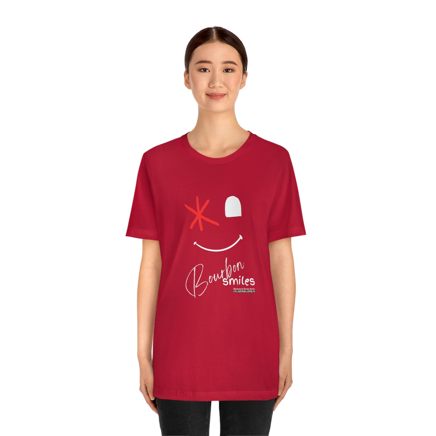 Bourbon Smiles Graphic Apparel | Smiley Face Bruised Eye | Unisex Jersey Short Sleeve T-shirt